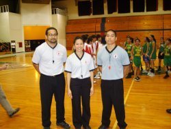 Jay Quinata, Susan Rupola, and Mycal Borja poses for the camera after the exhibition game