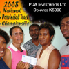 PDA owner Daisy Apore (with glasses) presents K5000
