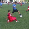 Coleman player about to leap over opponent
