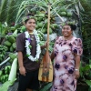 FSM Swimmer Debra Daniel and FSM Swim Coach Sweeter Daniel pose at the 2010 Pohnpei Liberation Day Games. Debra carries her award for overall best female athlete at the 7th Micronesian Games held in Palau.
