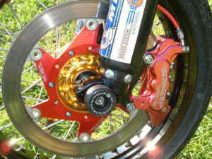 Lock wired brakes and axle slider