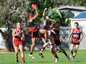 Sawtell/Toormina playing coach Jim Angel takes a strong mark against Coffs Swans. Photo: Leigh Jensen / Coffs Coast Advocate