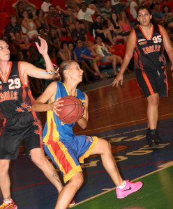 Danielle Totham driving to the hoop
