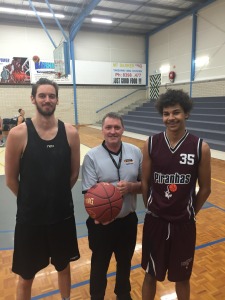 Photo is L-R: Tall Timber on the courts this summer: Tom Giles (Hackers), Leading Senior Referee – Ian Barham and Devon McGee (Piranhas)