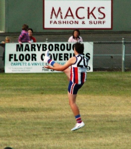 Nathan Holland kicks one of two goals for the game against Dunolly Under 17's.
