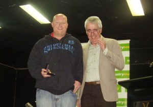 Mick Viney receives the 2010 Griffiths Medal from Gerry Griffiths