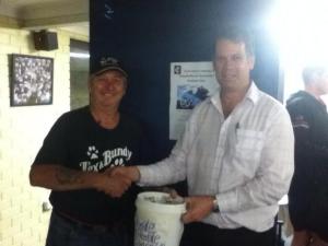 David Bowen, handing Tex our donations from the night