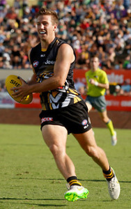 Kane Lambert made his AFL debut on 11/4/15 against the Western Bulldogs