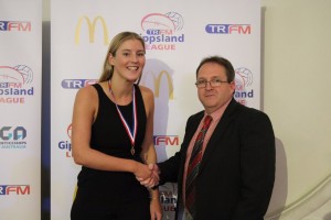 Joe Hutchison Medal A grade best and fairest Montana Holmes of Moe with Steve Hutchison